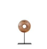 Wooden ring sculpture on a black stand.