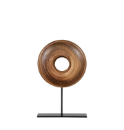 Wooden ring sculpture on a black stand.
