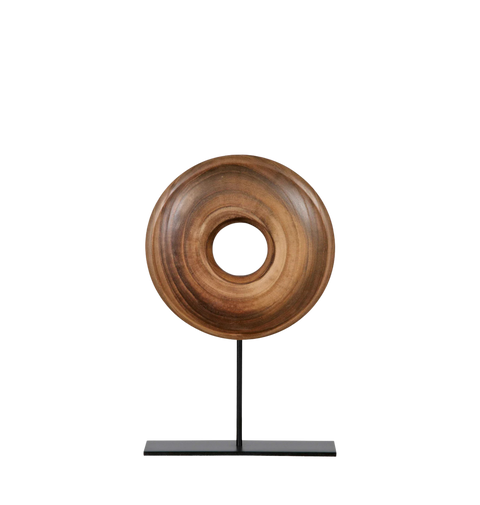 Wooden ring sculpture on a black stand.