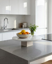 Modern kitchen with a bowl of fruit on a island