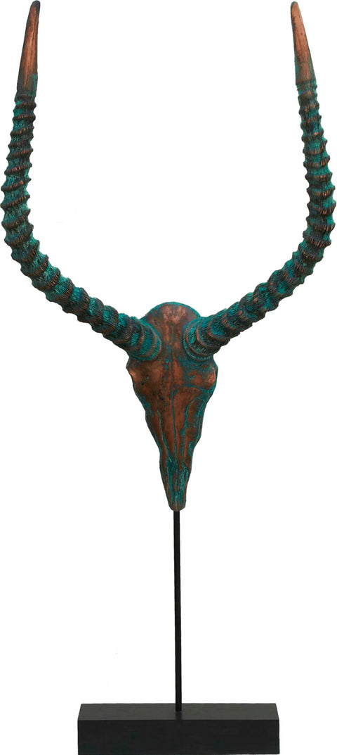 Decorative antelope horns with turquoise and brown coloration on a black stand against a white background.