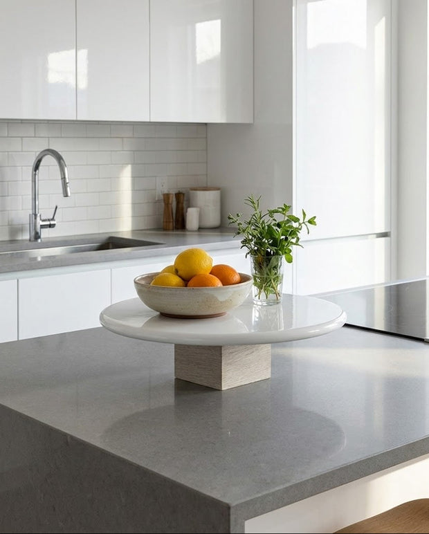 Modern kitchen with a bowl of fruit on a island