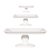 Set of three Guild Design Gallery white tiered trays on a white background. 