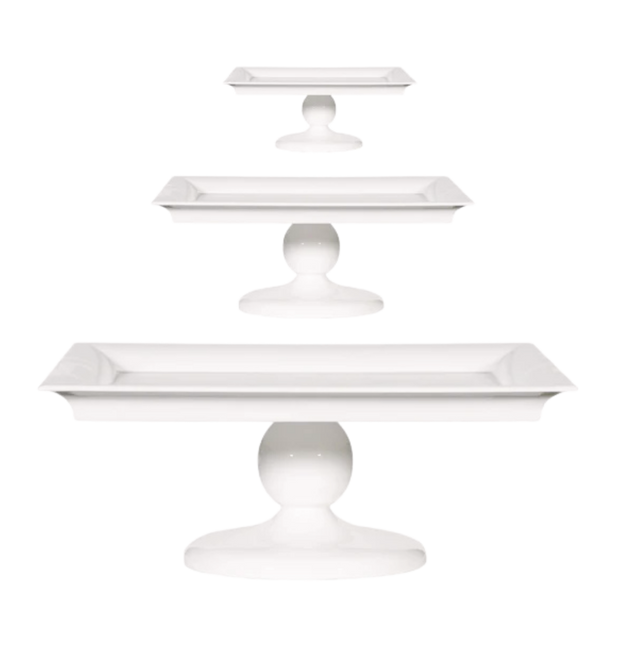 Set of three Guild Design Gallery white tiered trays on a white background. 