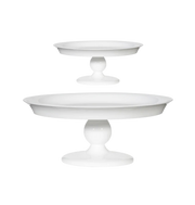 Two white cake stands on a white background