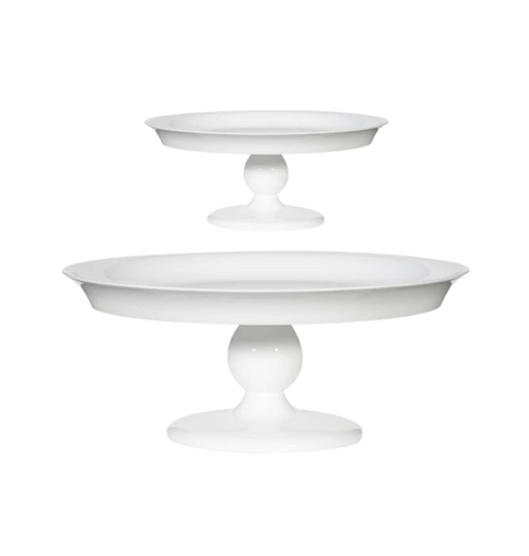 Two white cake stands on a white background