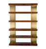 A tall, free-standing bronze shelving unit with multiple wooden shelves, featuring a geometric pattern of shelves and a solid bronze base.