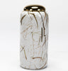 A white ceramic jar with a golden lid, decorated with painted bamboo sticks on the side, standing against a plain background.